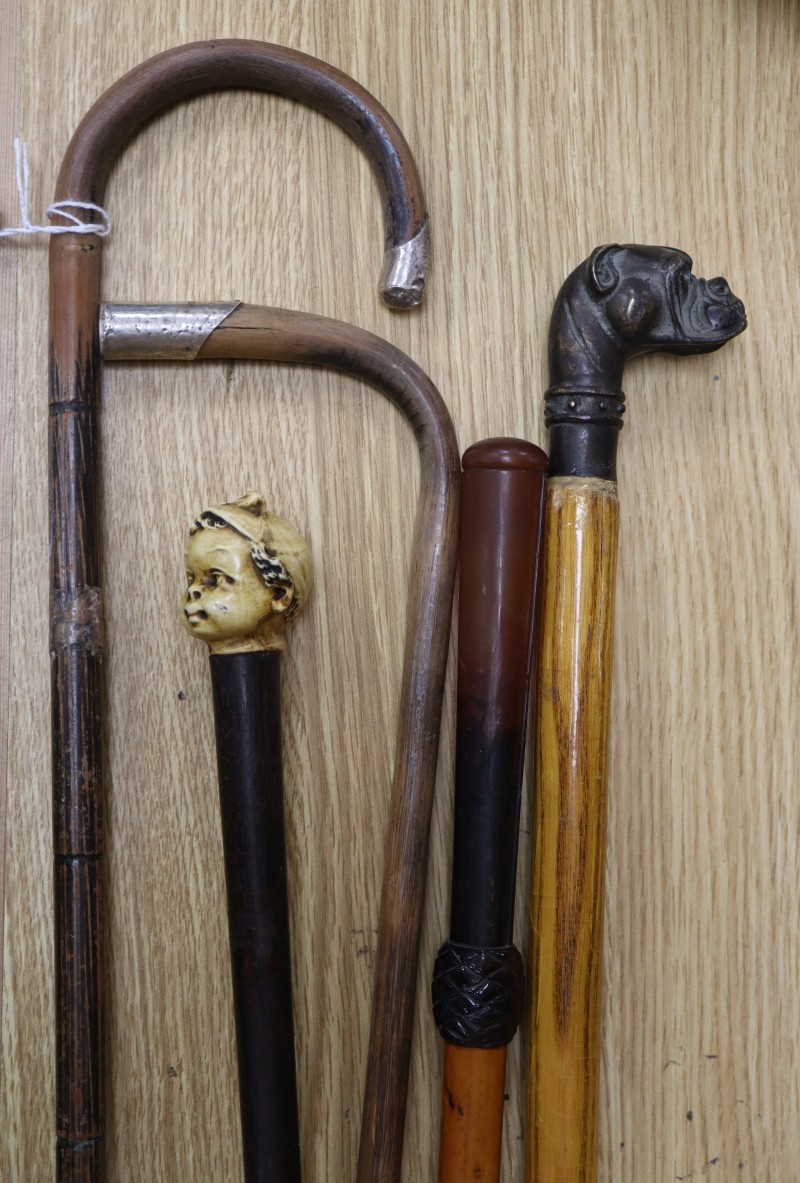 A late 19th / early 20th century stiletto sword cane, with faux tortoiseshell handle, locking collar and 35cm faceted toledo blade,